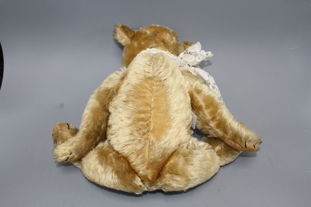 A Chiltern Hugmee c.1930 bear, 18in., blond mohair, hair loss front tummy, repair to right paw, split to left paw